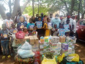 NAS celebrates 2020 reading session with orphans, donates items