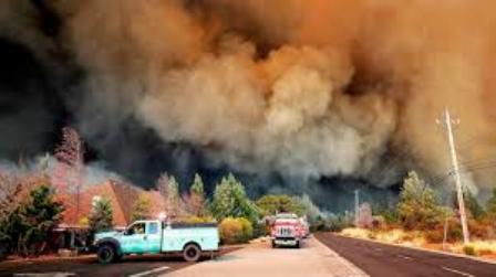 Over 14,000 firefighters battle massive California fires