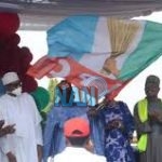  Presidency: Buhari presents APC Victory Flag to Tinubu