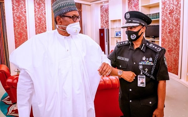 Minister presents new Ag. I-G Baba to Buhari