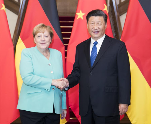 Merkel defends her promotion of scandal-hit Wirecard on China trip