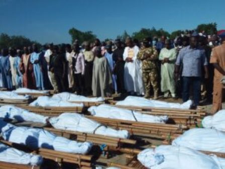 43 farmers killed by insurgents buried amid tears, wailing